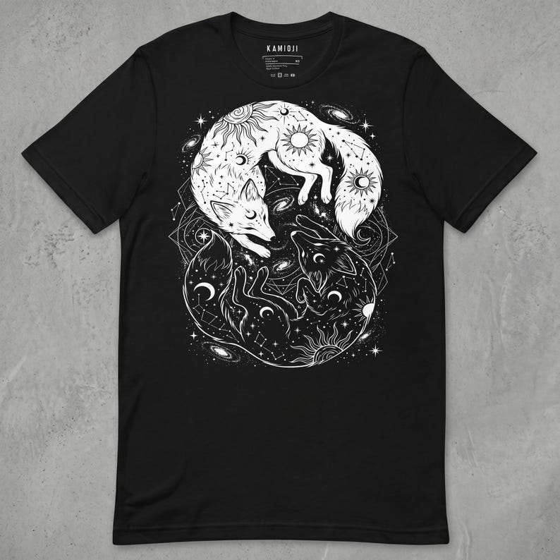 Celestial Yin Yang Fox. White and black foxes surrounded by cosmic motifs.