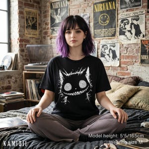 Trippy weirdcore Cheshire cat t-shirt. Unisex fit, casual streetwear for alternative fashion.