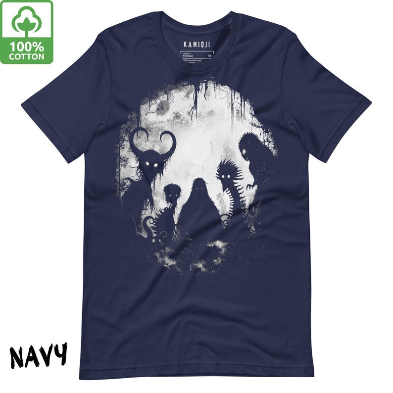Alien-inspired Bigfoot shirt featuring creepy scary black and white art. A gothic T-shirt by KAMIOJI, blending lofi horror, weirdcore, and alt clothing styles. Great as a weird stuff gift.