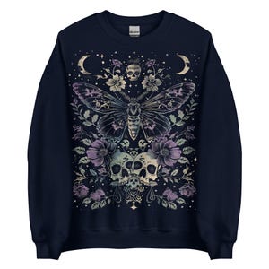 Luna moth sweatshirt with celestial butterfly and floral skull details. A KAMIOJI gothic clothes pullover, ideal for dark cottagecore, pastel goth, and goblincore fashion.