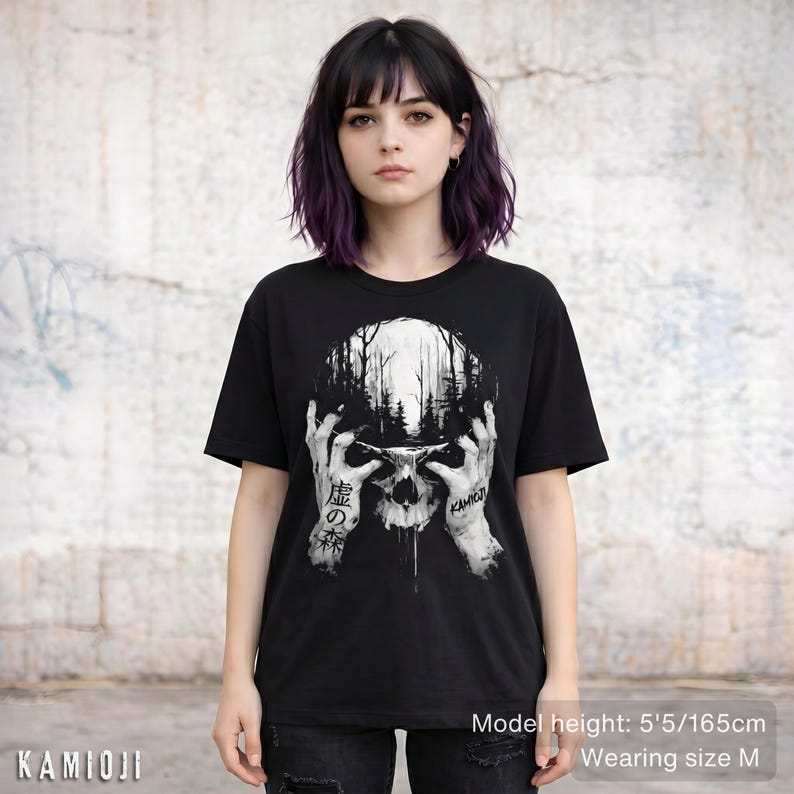 Alternative gothic clothes with a skull design, eerie forest backdrop. Unisex fit.