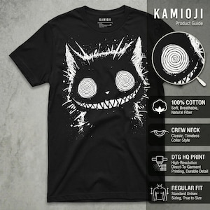 May include: Black crew neck t-shirt featuring a white graphic of a cat with spiral eyes and a wide grin. The shirt is made of 100% cotton and has a regular fit. The brand name "KAMIOJI" is printed at the top.