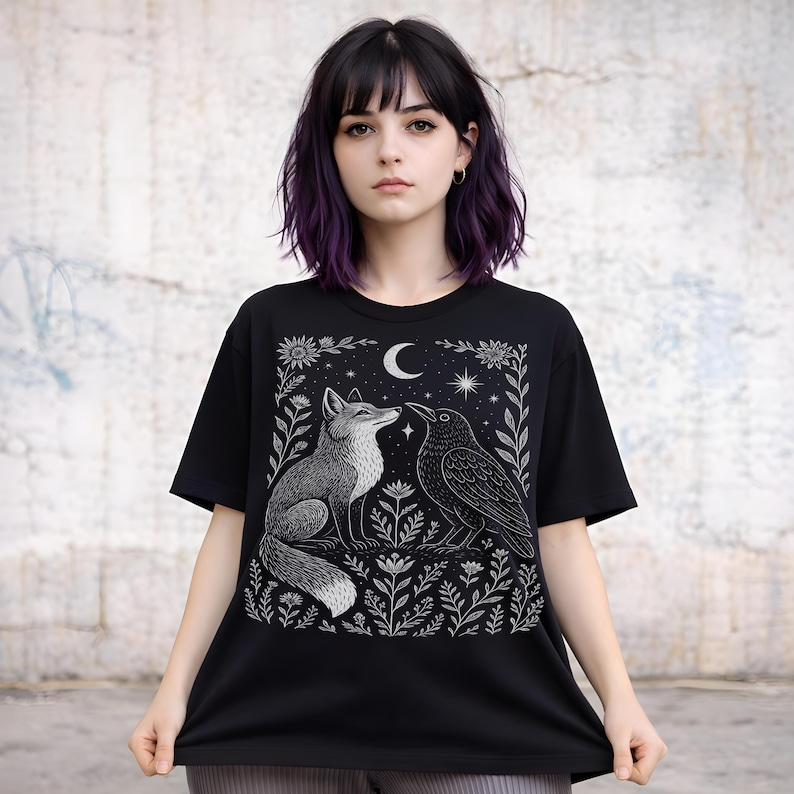 Cottagecore t shirt featuring a crow and fox in a celestial scene, perfect for naturecore lovers