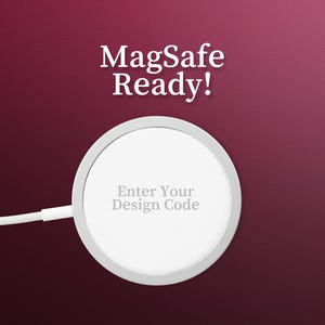May include: A white wireless charging pad with a silver rim. The pad has the text "Enter Your Design Code" printed on it. The pad is on a burgundy background with the text "MagSafe Ready!" above it.