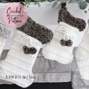 May include: A set of two white crocheted Christmas stockings with brown faux fur trim and pom-poms. The stockings are hanging on a fireplace mantel. The text "Crochet Pattern" and "BUNDLE: All 2 Sizes" is visible in the image.