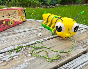 Juguete vintage para arrastrar para niños MR. Juguete de arrastre Cala-Piller de WIGGLE