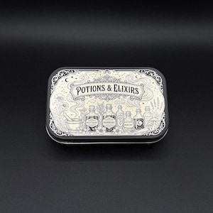 May include: A rectangular metal tin with a black border and a cream-colored lid featuring the text POTIONS & ELIXIRS. The lid design includes illustrations of various glass bottles, a mortar and pestle, flowers, and celestial patterns.