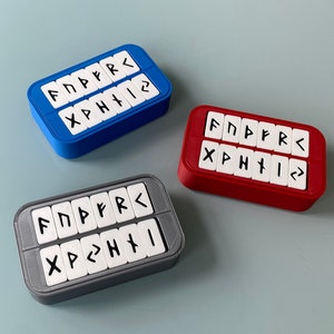 Rune Set for Altoids tin boxes showing three color options. Red, Blue and Grey.