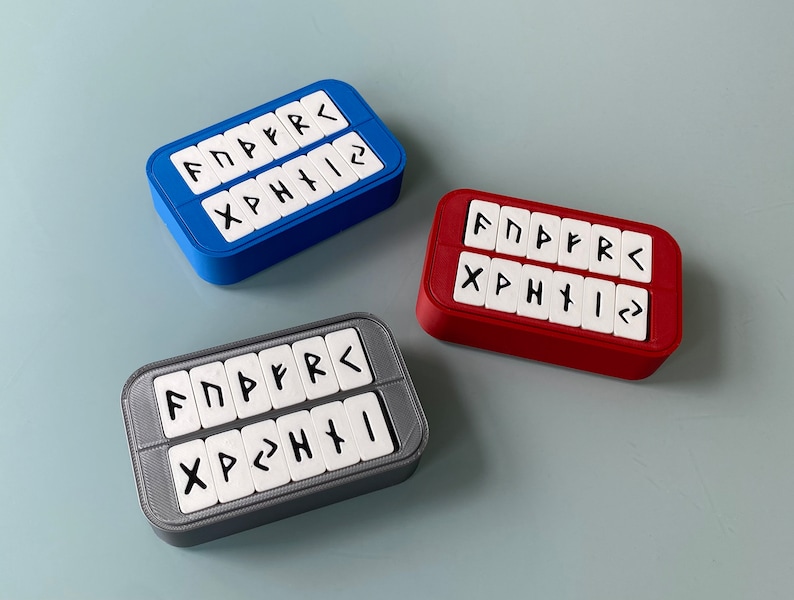Rune Set for Altoids tin boxes showing three color options. Red, Blue and Grey.