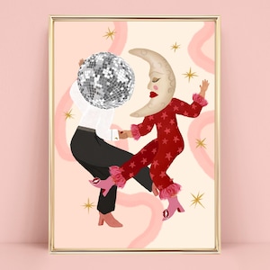 May include: A framed art print depicting two dancing figures. One has a disco ball head, the other a crescent moon head. The moon figure wears red star-patterned pyjamas and pink boots. The background is pale pink with gold stars.