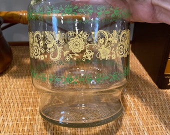 Jarra de vidrio vintage con estampado floral amarillo y verde
