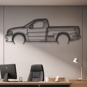May include: Black metal wall art depicting a pickup truck in profile. The truck is outlined in a simple, minimalist style.