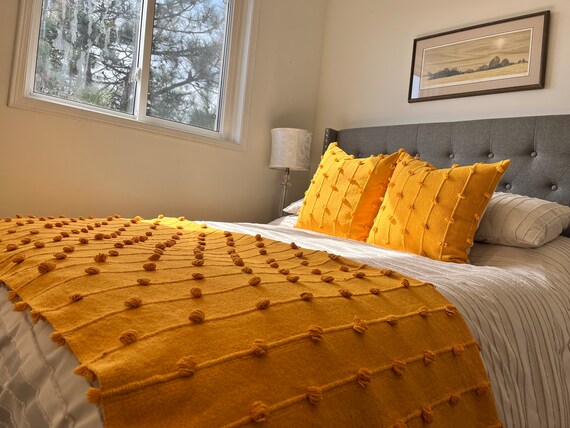 Yellow throw blanket and pillows hotsell