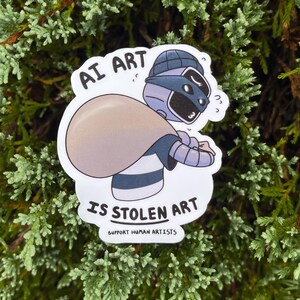 A sticker of a robot holding a bag over his shoulder.