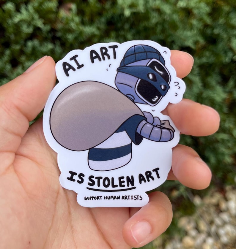 A sticker of a robot holding a bag over his shoulder.