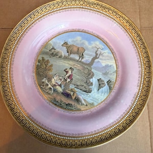 Vintage, possibly 19th-centurym F&R Pratt porcelain plate features a pink ground and a transfer-printed scene