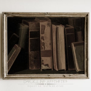 May include: A framed painting of a still life featuring a collection of old, worn books in various shades of brown and green. The books are arranged vertically, with some leaning against others, creating a sense of depth and texture. The painting is set against a dark background, highlighting the details of the books.