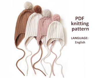 Könnte beinhalten: Drei gestrickte Mützen mit Bommeln in Braun, Creme und Rosa. Jede Mütze hat lange Bänder, die unter dem Kinn gebunden werden können. PDF-Strickmuster, Sprache: Englisch.