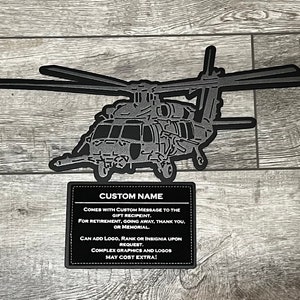 May include: Black and gray custom patch of a helicopter with a text box that says "CUSTOM NAME" and includes information about the patch.  The text reads: "Comes with custom message to the gift recipient. For retirement, going away, thank you, or memorial. Can add logo, rank or insignia upon request. Complex graphics and logos may cost extra!"
