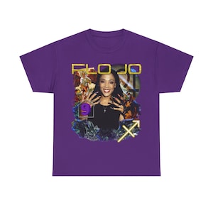 May include: Purple t-shirt with a collage design featuring a woman, the text "FLO JO", and a Sagittarius zodiac symbol.