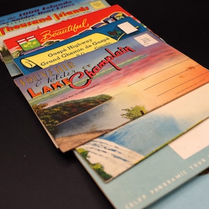 Envelopes de lembrança vintage com cartões e imagens extraíveis da década de 1960