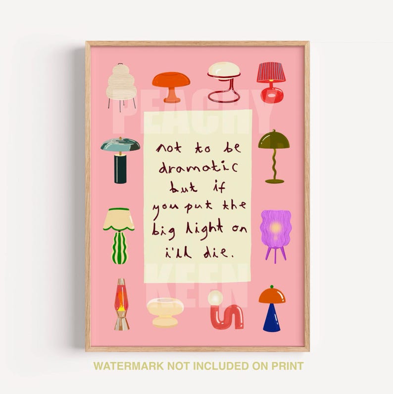 May include: A framed art print on a pink background featuring various colorful lamp illustrations surrounding a central cream-colored rectangle with the handwritten text: not to be dramatic but if you put the big light on i'll die.