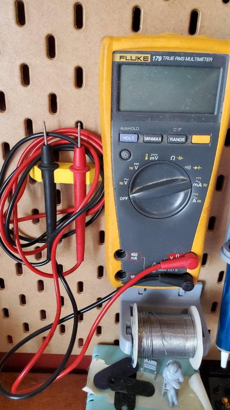 IKEA SKADIS Fluke 179 Multimeter Mount - Wall Pegboard Holder for Test Meter and Probes - Workshop Organization Tool image 1