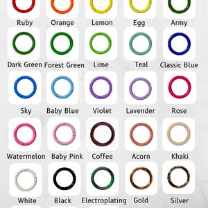 May include: A color chart for keyhooks, featuring a variety of colors including Ruby, Orange, Lemon, Egg, Army, Dark Green, Forest Green, Lime, Teal, Classic Blue, Sky, Baby Blue, Violet, Lavender, Rose, Watermelon, Baby Pink, Coffee, Acorn, Khaki, White, Black, Electroplating, Gold, Silver, Cream, Grey, and Navy Keyring.