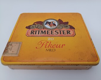 Ritmeester Pikeur Mild Cigars Vintage Tin 1970's Holland depicts Dutch Knight with Horse on Yellow Background