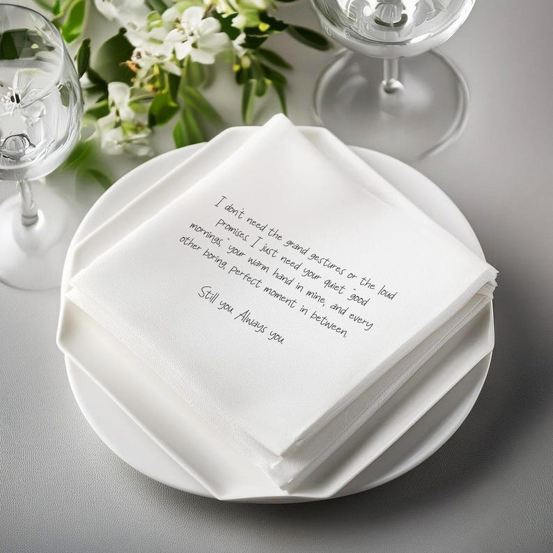 White linen napkin with a handwritten poem about simple love.