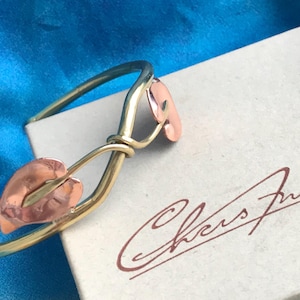 Vintage copper and brass cuff bracelet by designer Chris Anderson. Original handcrafted bangle, 80s.