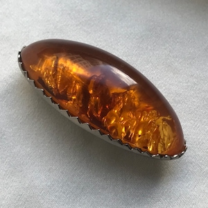 Vintage bernite cabochon brooch. Costume brooch style 1930s.