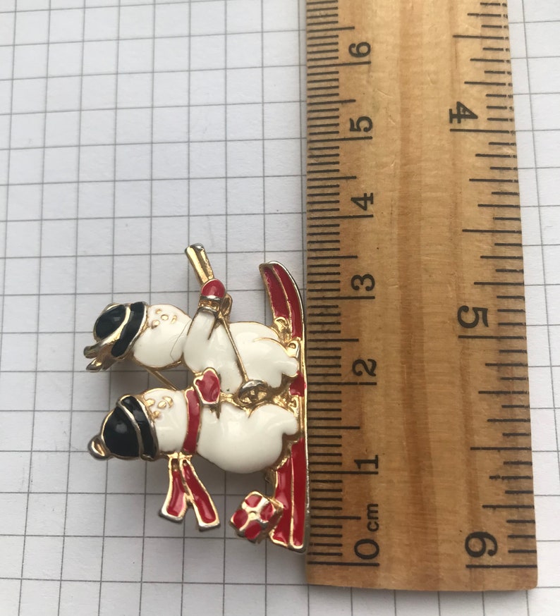Broche vintage m?daille sportive ski - Montres & Bijoux