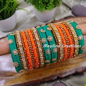 Rich kundan silk thread bangles with metal bangles