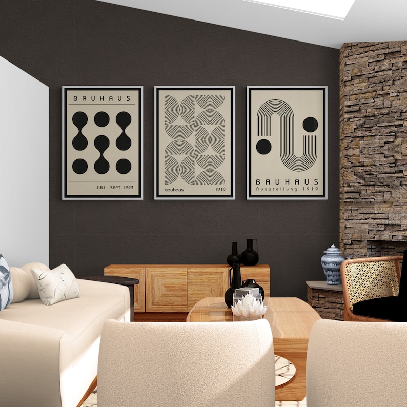 May include: Three minimalist black and white Bauhaus art prints with geometric shapes and the text "Bauhaus" and "Ausstellung 1919".