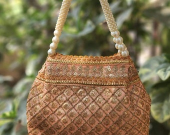 Classy  Traditional Potli / Clutch/ Handbag with Pearl work handle