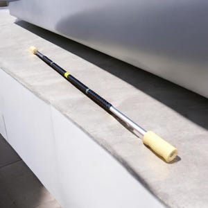 Fire juggling stick with removable phosphorescent rings