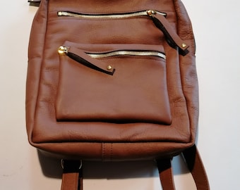 brown leather backpack