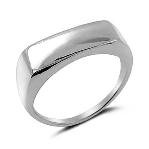 May include: A polished silver ring with a rectangular top. The ring has a smooth, reflective surface and a rounded band. The design is simple and modern, suitable for everyday wear.