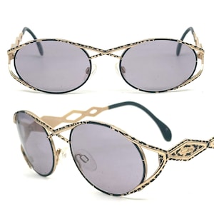 Cazal MOD 977 x cross bridge-temples oval golden metal sunglasses w black enameled details, mint