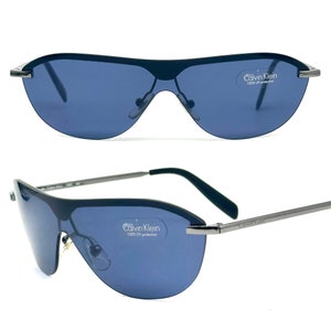Calvin Klein 168S silver metal shield frames mask sunglasses with blue lens vintage 90s NoS