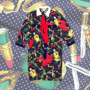 Abigaille NOS 80s pure silk baroque dress shirt, cigarettes & makeup over polka dot allover, super cool and minty.