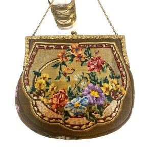 Auth. 1920s petit point crochet hand bag with floral motif and brass frame and chain, 1930s ca, mint condition.