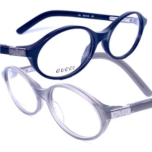 Gucci 2445 oval acetate eyeglasses frames in black and translucent grey culourways, made in italy 1980s NOS