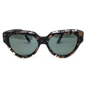 Agora by Polaroid 8394 Vintage schwarz braune Schildpatt Acetat Cat Eye-Sonnenbrille mit schwarzen Gläsern, 1990s NOS. Gerahmt in Italien