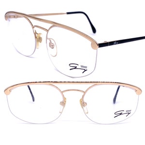 Genny 518 oval flat top rimless eyeglasses frames hand made in Italy, coolest minimalist design 1980s NoS
