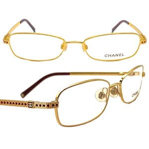 Chanel 2075-B rectangular golden metal frames w ruby red jeweled & embossed details along temples, NOS 90s Italy