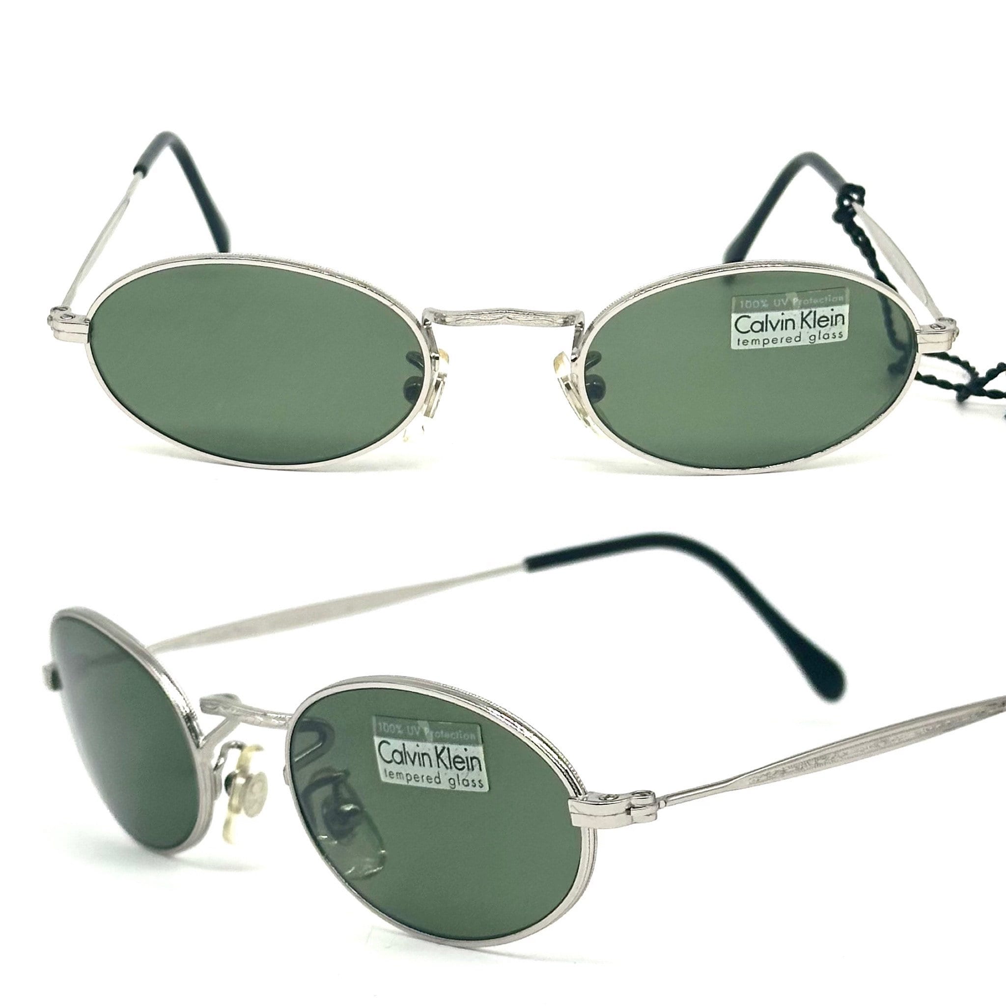 Calvin Klein 330S Old School Oval Silver Sunglasses W Tempered Crystal Lenses NOS 90s Italy