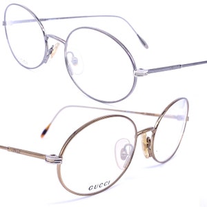 Gucci GG2633 thin oval eyeglsses frames coming in brass or gunmetal, NOS 90s Italy