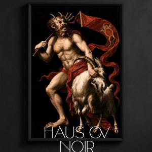 May include: A framed art print featuring a muscular, horned figure with a beard, draped in red fabric, holding a staff and a red banner, standing beside a white goat against a black background. The text HAUS OV NOIR is printed in white at the bottom.